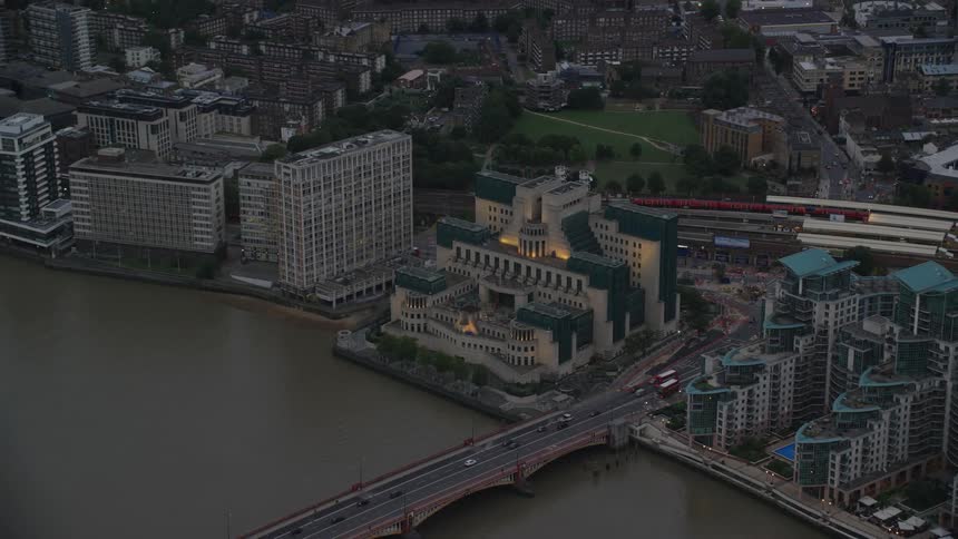 Aerial view of mi6 government agency near a river in the city