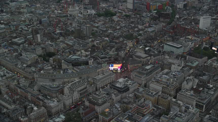 Aerial view of colorful digital display on an european city