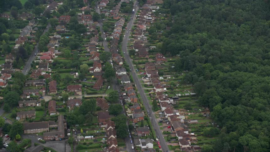 Aerial view of a residential zone amidst green areas