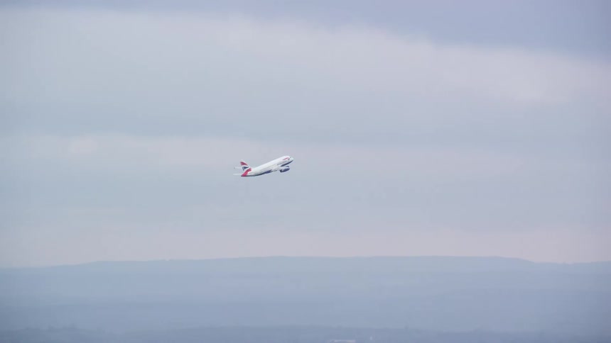 Airplane taking off with its nose pointed upwards