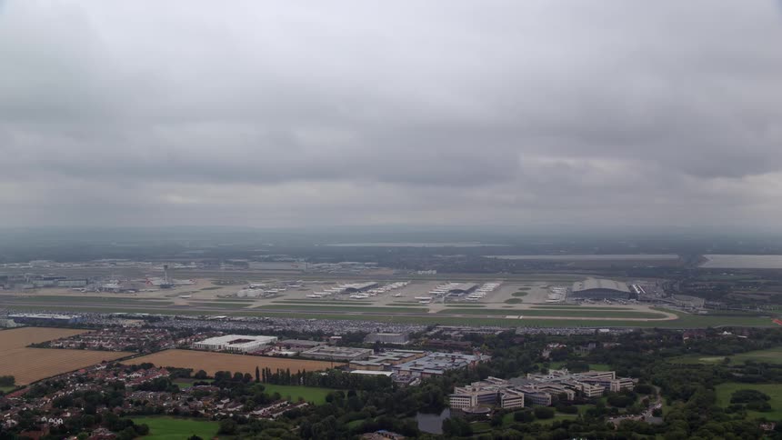 Aerial view of a rural area with residential areas factories and lakes