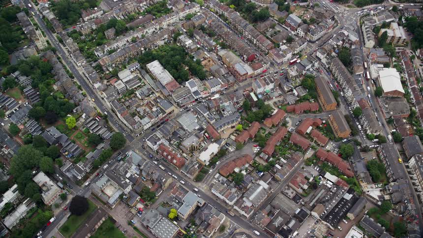 An aerial view of a residential area with lots of trees