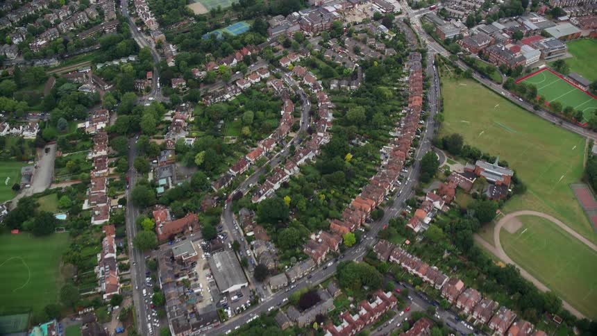 Aerial of a residential neighborhood with small urban houses