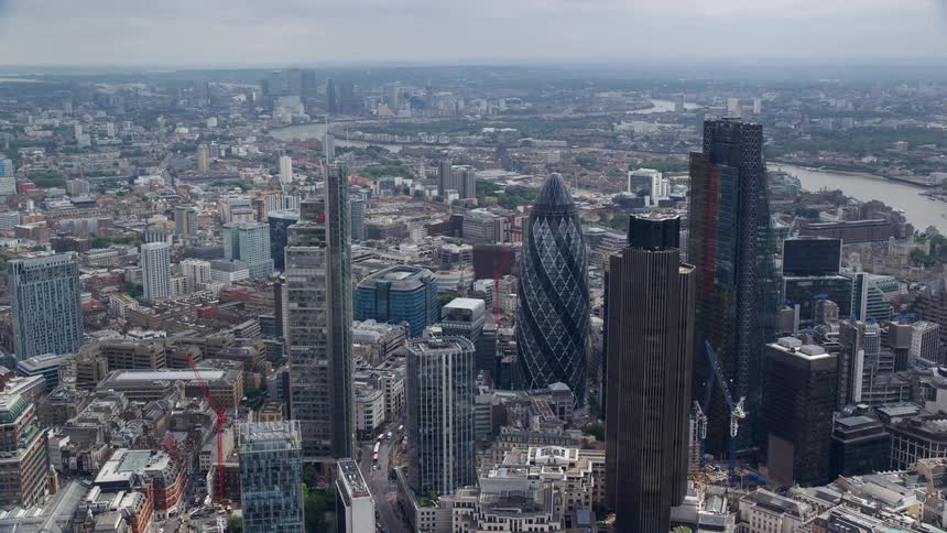 Aerial view of skyscrapers and buildings near the river in london