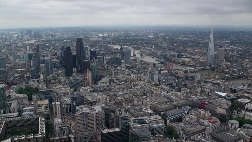 City skyline with towers and skyscrapers on a cloudy day