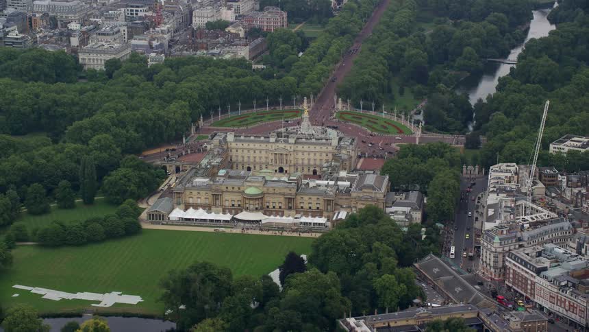 A building with ancient architecture in the shape of a mansion alongside residential buildings