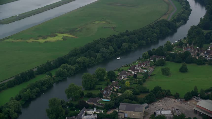Aerial view of a small residential area by the river