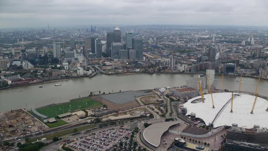 Aerial view of a large city divided by a river