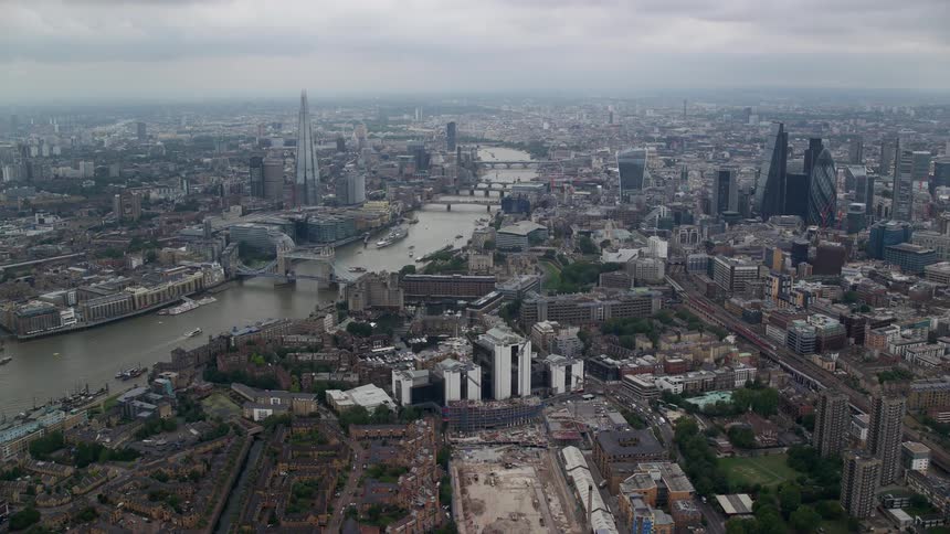 Aerial view of river thames and skyscrapers and buildings in a city