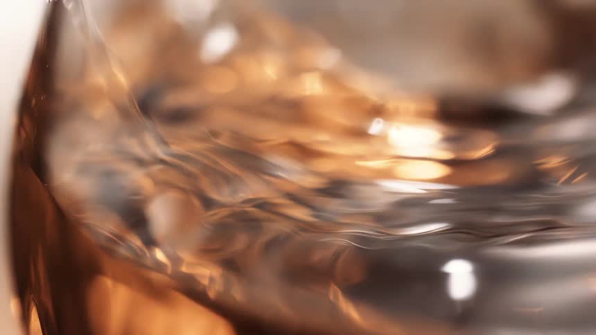 The glass is being filled