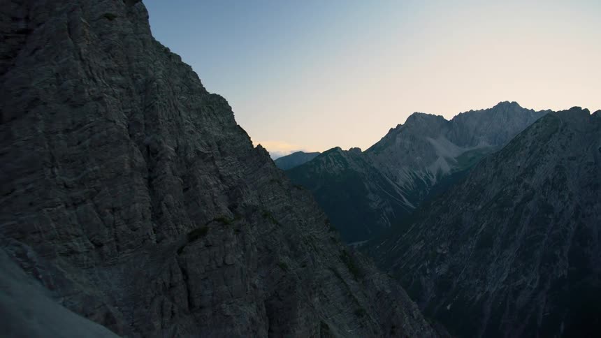 A series of mountain with rough edges in dawn