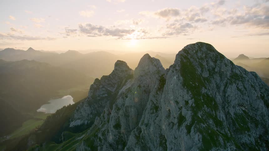 Fog is covering the mountains at sunrise