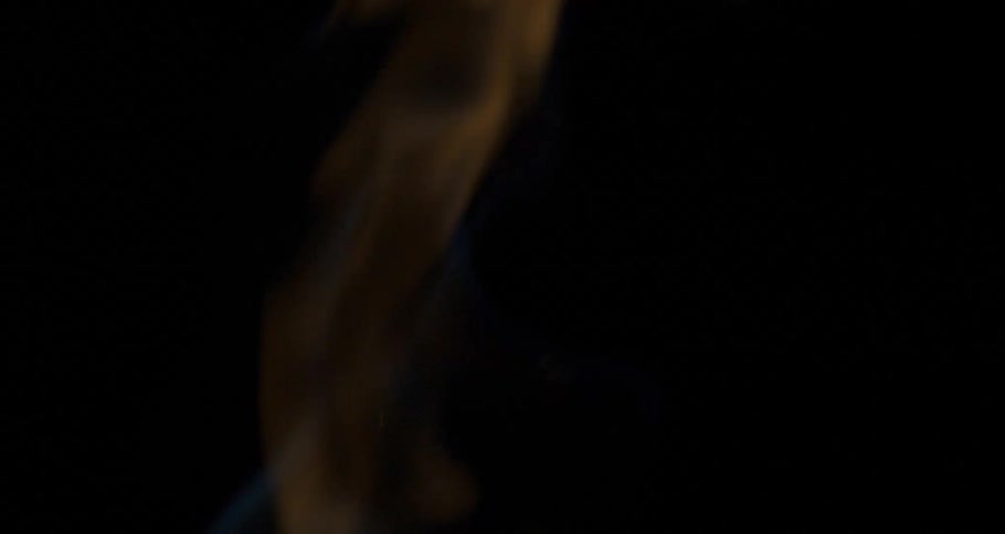 Yellow flames against a black background