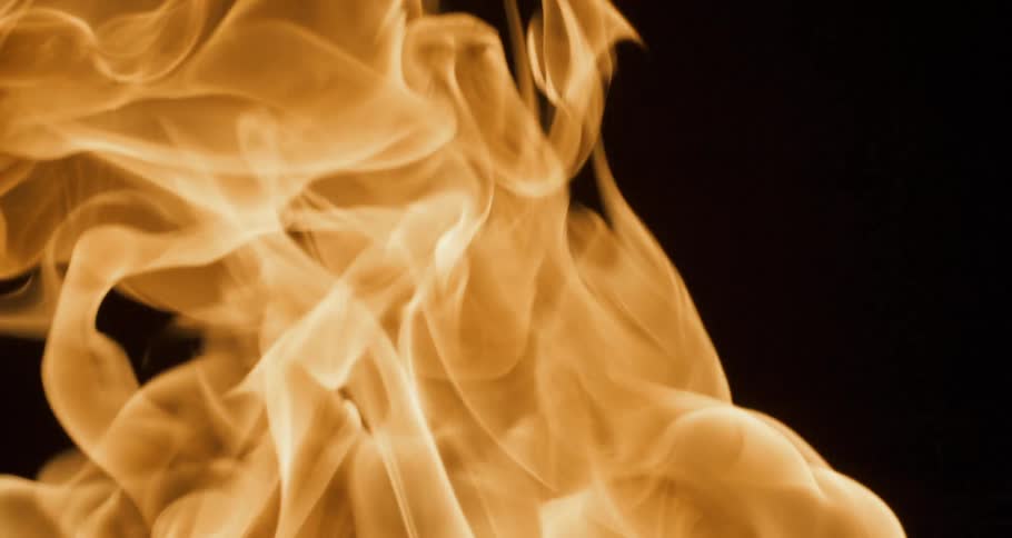 A smoky flame of goden fire rising