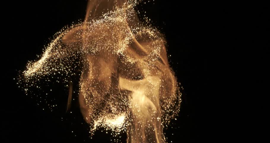 A blazing fire with lots of sparks going upwards