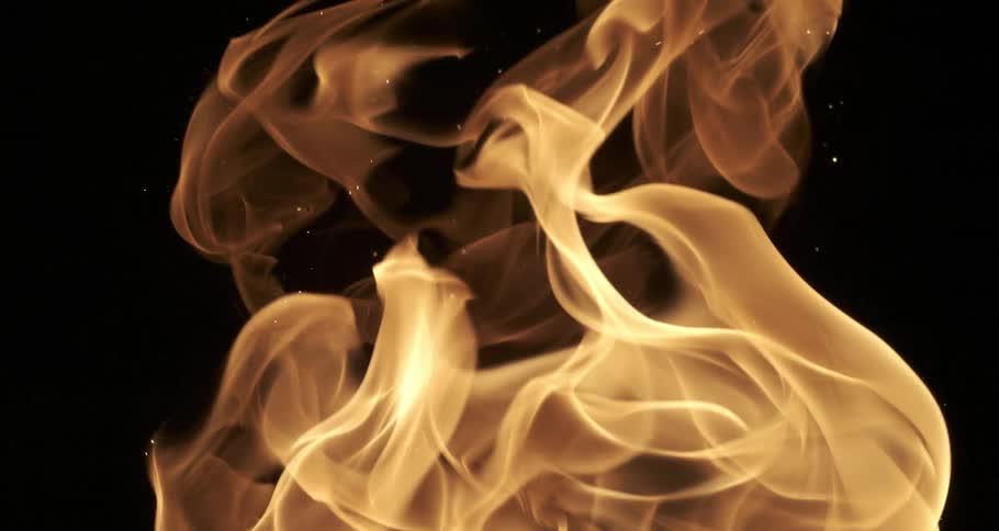 A strong flame of incandescent fire on a black background
