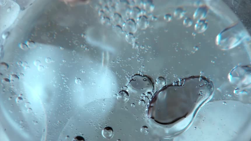 Extreme closeup of abstract water bubbles in motion