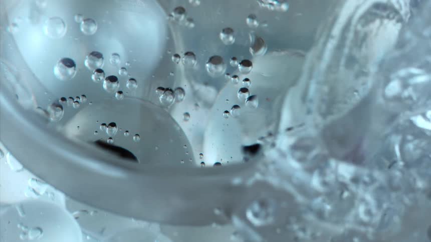 Water being poured and forming bubbles