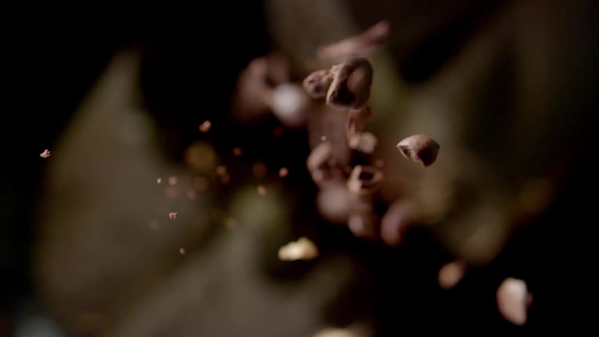 Chocolate pieces fall from dessert