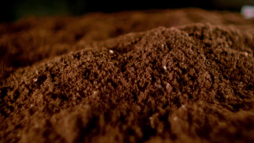 Brown food crumbs form heaps