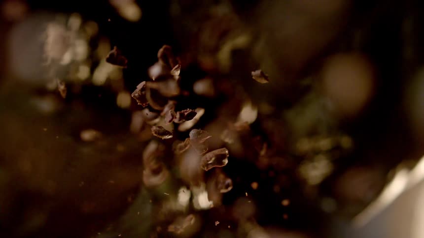 Various particles and pieces of objects flying