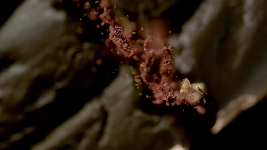 The food is broken and crumbs fly