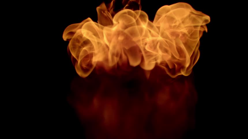 An incandescent flame of fire against a black background
