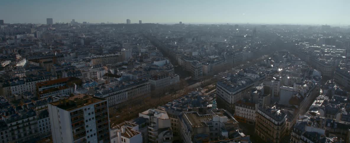 An aerial view of a city at dusk