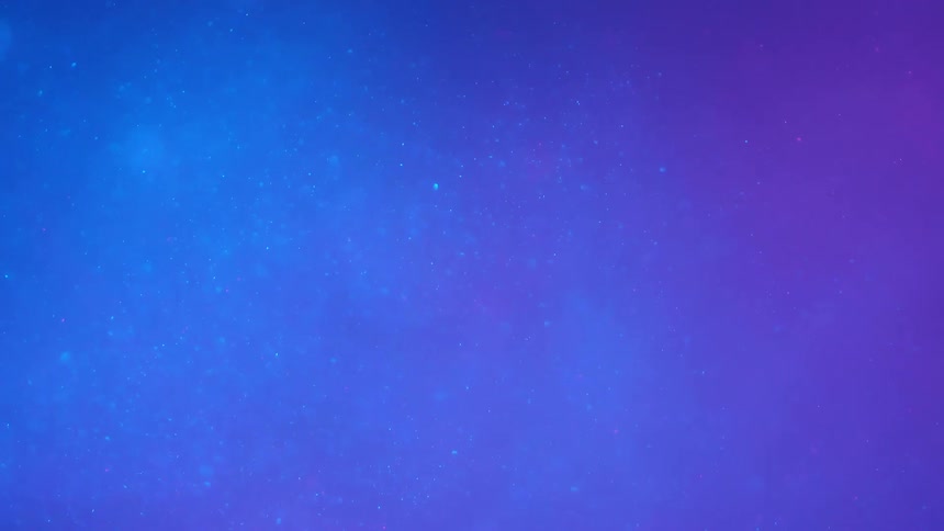 Floating sparkling metallic particles with neon lighting background