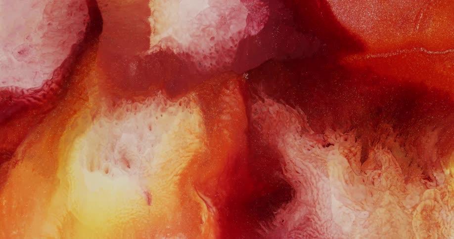 Colorful abstract shapes of blooming liquid metallic ink
