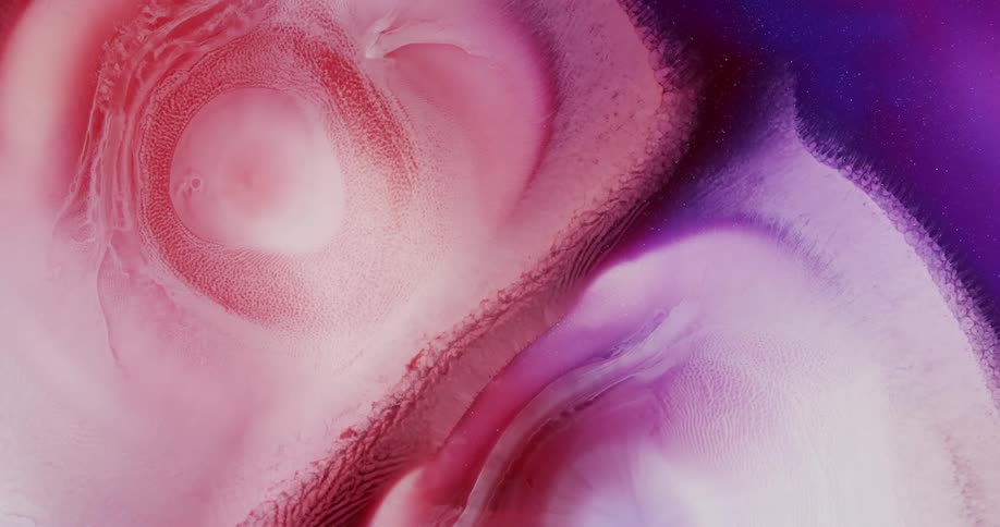 Colorful abstract shapes of blooming liquid metallic ink