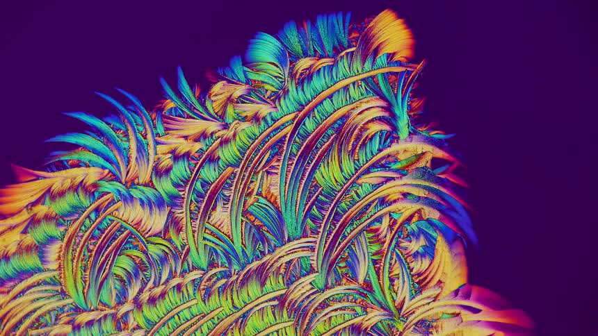 Abstract patterns of crystals from salicylic acid under microscope
