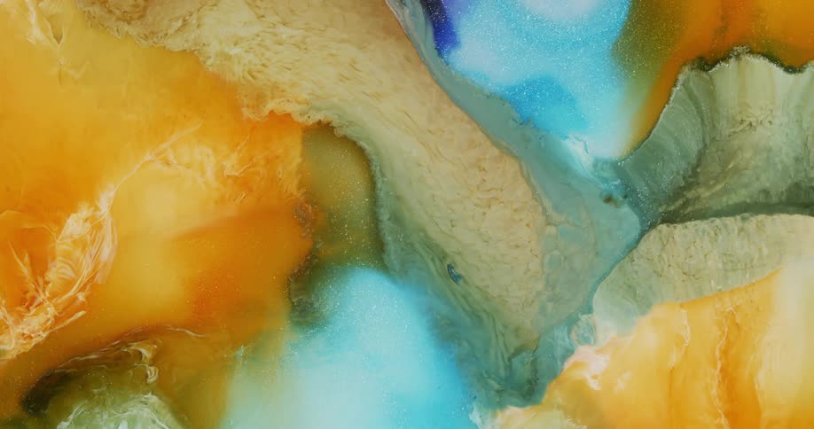 Colorful abstract shapes of blooming liquid metallic ink