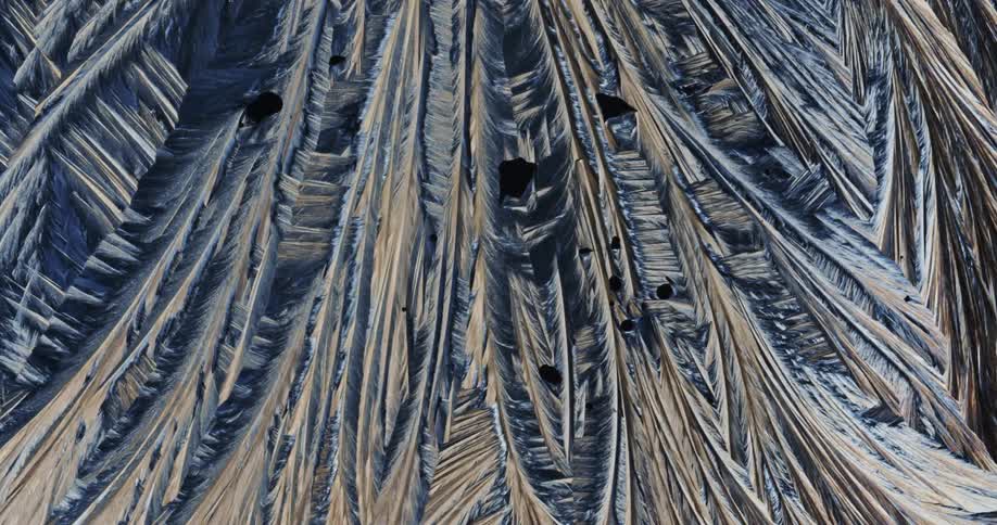 Microscopic view of sulfur crystals forming