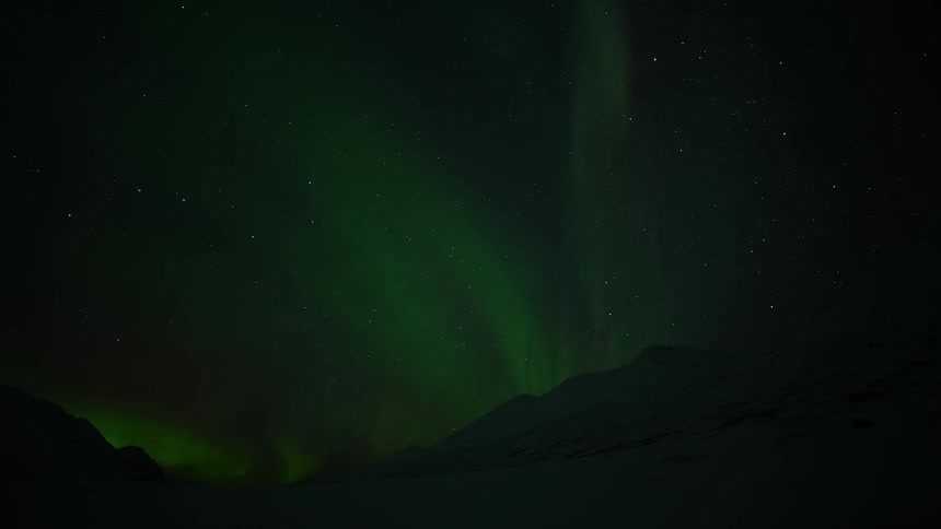 A display of an aurora borealis in the night sky