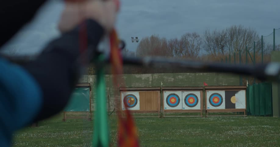 Archer prepares to take a shot with bow and arrow