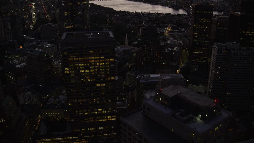 Aerial of buildings in a metropolitan area at night