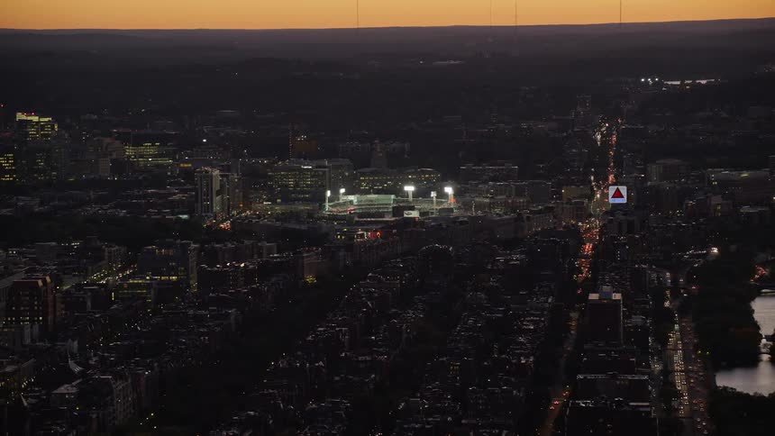 Aerial view of a stadium in the city at evening