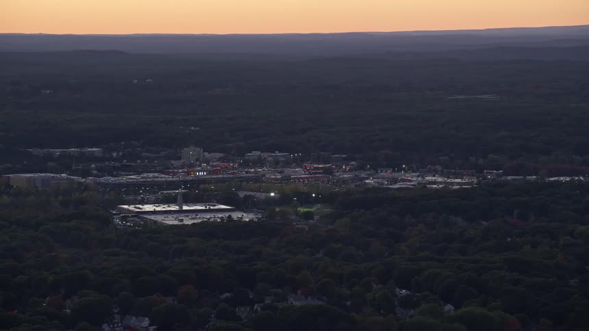 Aerial of buildings and trees in a suburban area