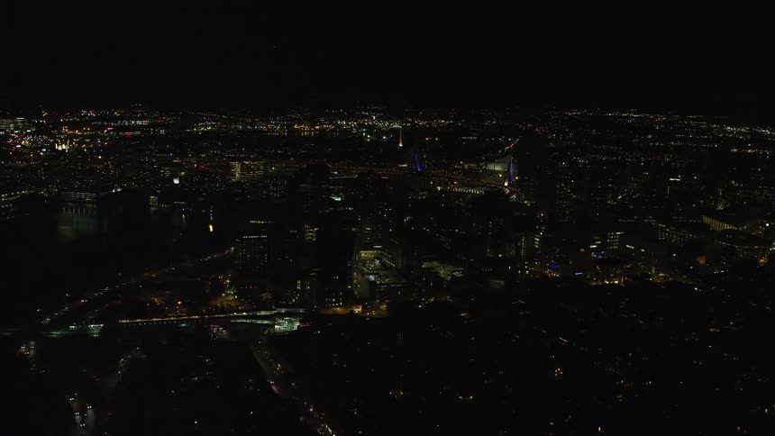 A night city being illuminated by the lights of apartments and houses