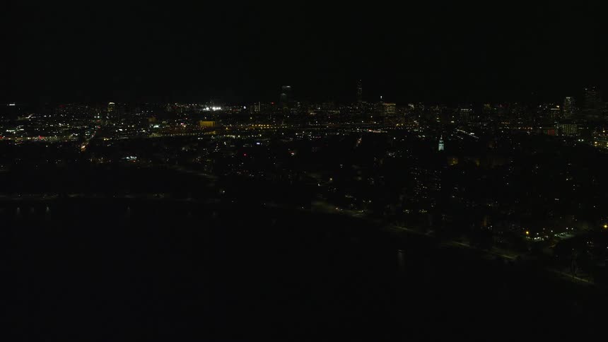 Aerial of buildings in a metropolitan area at night
