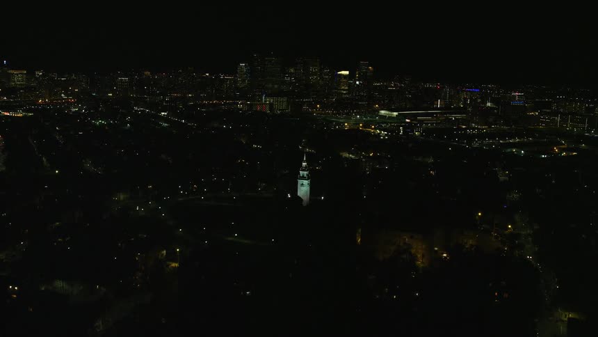 Aerial view from a drone flight over a downtown area at night