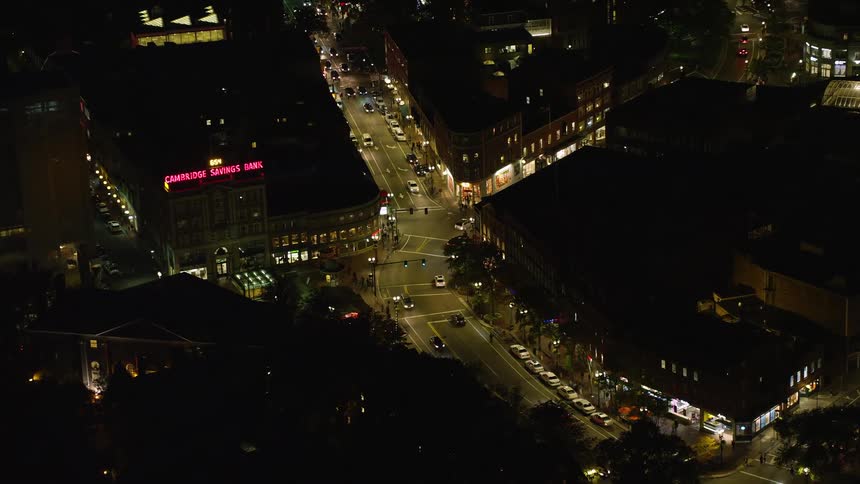 Aerial view of a city center a bank building and streets at night