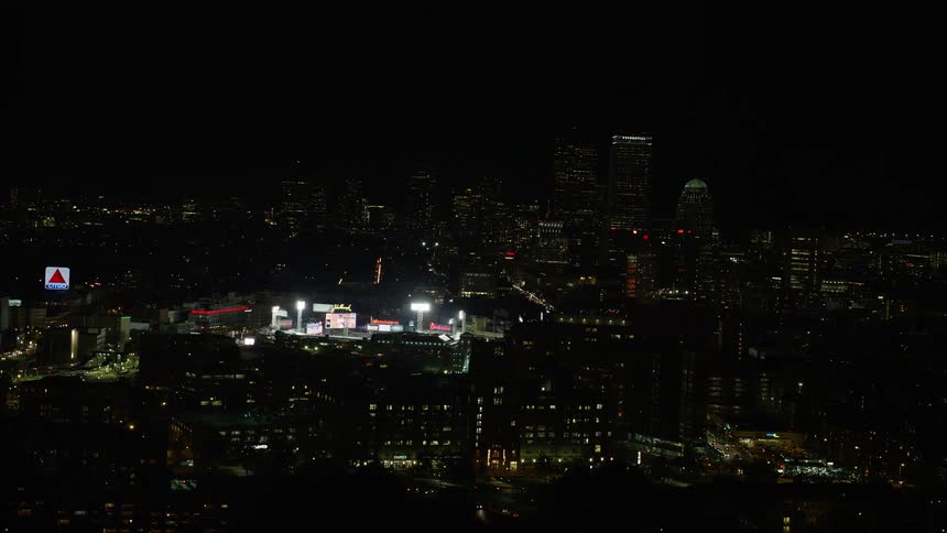 Aerial of buildings in a metropolitan area at night