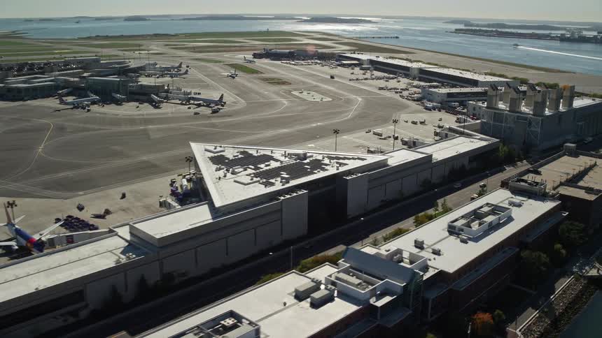 Aerial view of an airport by the sea
