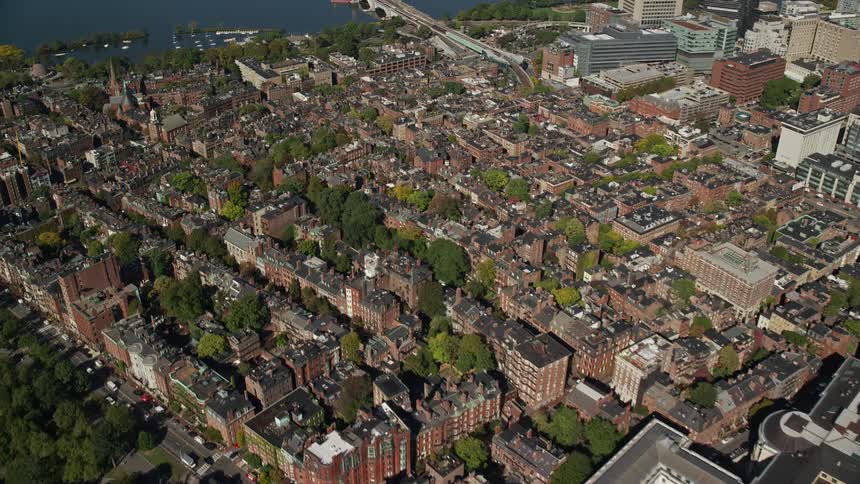 Aerial view of an urban city by the sea