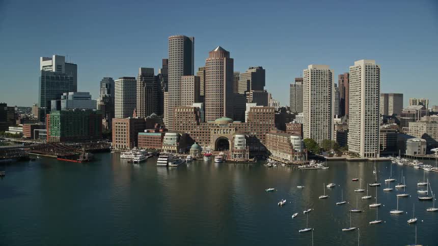 A city with huge buildings facing the sea