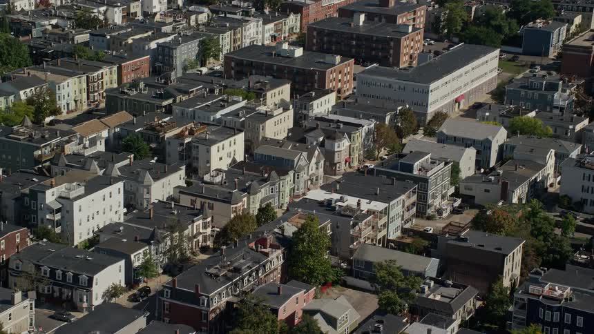 Apartment buildings line parallel streets in residential neighborhood