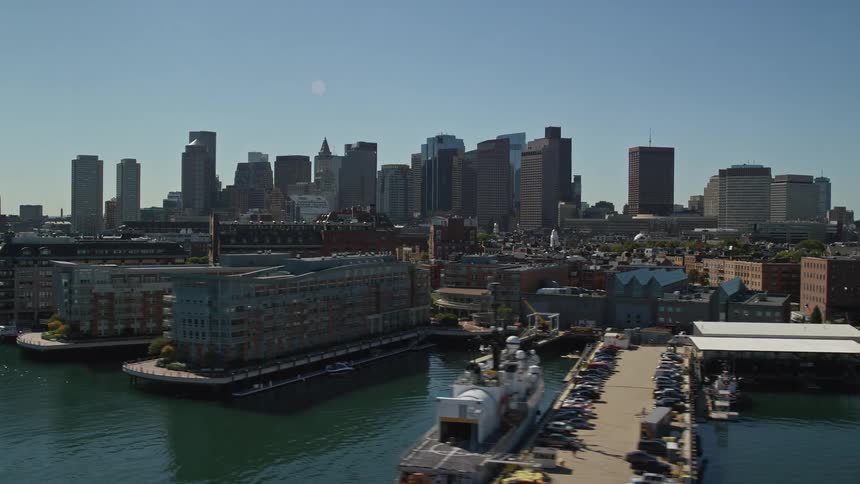 A metropolitan city in front of a sea