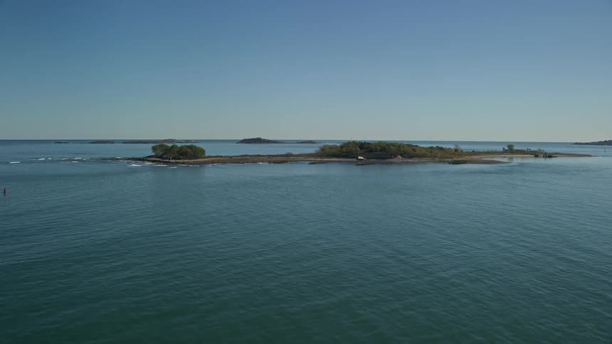 A small island in the middle of the sea